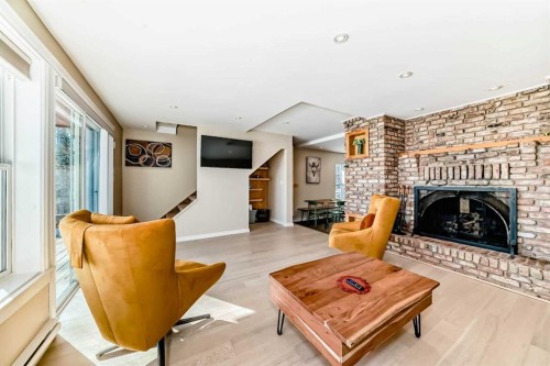 157 Grand Avenue, Norglenwold, AB - Indoor Photo Showing Living Room With Fireplace