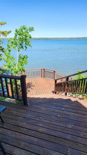 157 Grand Avenue, Norglenwold, AB - Outdoor With Body Of Water With Deck Patio Veranda With View