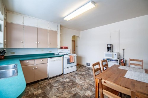 3505 45 Avenue, Red Deer, AB - Indoor Photo Showing Kitchen With Double Sink