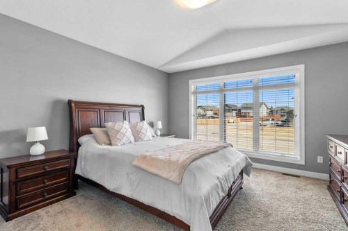 30 Brookstone Drive, Sylvan Lake, AB - Indoor Photo Showing Bedroom