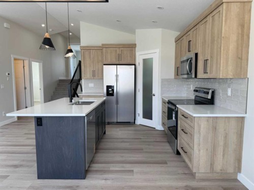 52 Emmett Crescent, Red Deer, AB - Indoor Photo Showing Kitchen With Stainless Steel Kitchen With Double Sink With Upgraded Kitchen