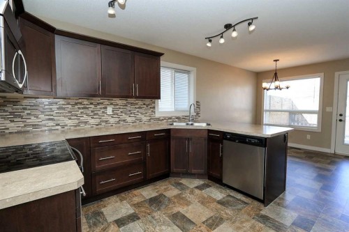 85 Cedar Crescent, Blackfalds, AB - Indoor Photo Showing Kitchen With Double Sink