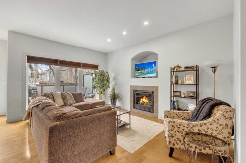 132 Ingle Close, Red Deer, AB - Indoor Photo Showing Living Room With Fireplace