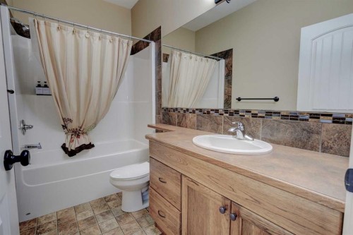 82 Harvest Close, Penhold, AB - Indoor Photo Showing Bathroom