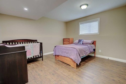 82 Harvest Close, Penhold, AB - Indoor Photo Showing Bedroom
