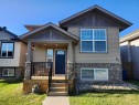 82 Harvest Close, Penhold, AB  - Outdoor With Facade 