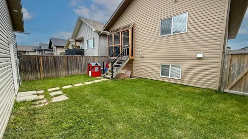 82 Harvest Close, Penhold, AB - Outdoor With Exterior