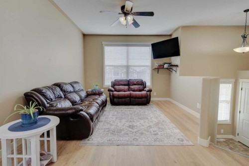 82 Harvest Close, Penhold, AB - Indoor Photo Showing Living Room