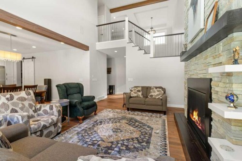 41 Cole Way, Sylvan Lake, AB - Indoor Photo Showing Living Room With Fireplace