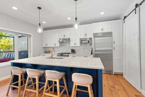 41 Cole Way, Sylvan Lake, AB - Indoor Photo Showing Kitchen With Stainless Steel Kitchen With Double Sink With Upgraded Kitchen
