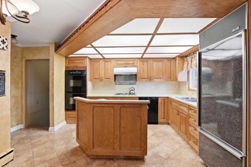 3919 43 Avenue, Red Deer, AB - Indoor Photo Showing Kitchen With Double Sink