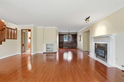 3919 43 Avenue, Red Deer, AB - Indoor Photo Showing Living Room With Fireplace