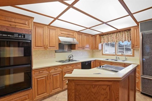 3919 43 Avenue, Red Deer, AB - Indoor Photo Showing Kitchen With Double Sink