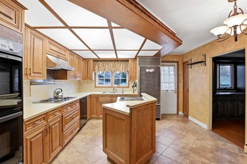 3919 43 Avenue, Red Deer, AB - Indoor Photo Showing Kitchen With Double Sink
