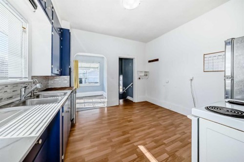 5017 54 Ave, Ponoka, AB - Indoor Photo Showing Kitchen With Double Sink