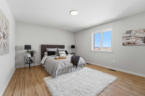 78 Parlby Crescent, Lacombe, AB - Indoor Photo Showing Bedroom