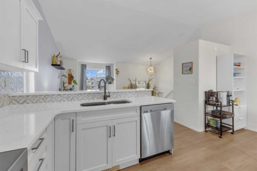 26 Mckinlay Crescent, Lacombe, AB - Indoor Photo Showing Kitchen With Double Sink