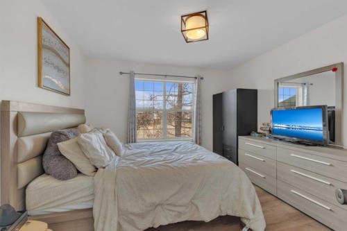 26 Mckinlay Crescent, Lacombe, AB - Indoor Photo Showing Bedroom
