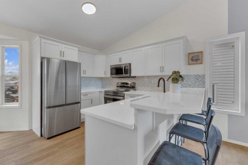 26 Mckinlay Crescent, Lacombe, AB - Indoor Photo Showing Kitchen With Upgraded Kitchen