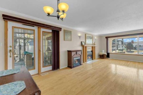 231 Barrett Drive, Red Deer, AB - Indoor Photo Showing Living Room With Fireplace
