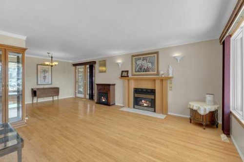 231 Barrett Drive, Red Deer, AB - Indoor Photo Showing Living Room With Fireplace