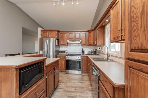 52 Archibald Crescent, Red Deer, AB - Indoor Photo Showing Kitchen With Double Sink