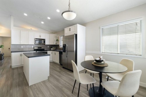 65 Macewan Ridge Circle Nw, Calgary, AB - Indoor Photo Showing Dining Room