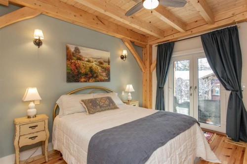 1130 Breakers Way, Sunbreaker Cove, AB - Indoor Photo Showing Bedroom