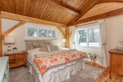 1130 Breakers Way, Sunbreaker Cove, AB - Indoor Photo Showing Bedroom