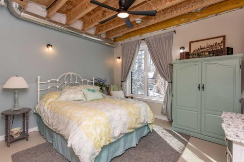 1130 Breakers Way, Sunbreaker Cove, AB - Indoor Photo Showing Bedroom