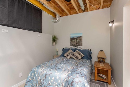 1130 Breakers Way, Sunbreaker Cove, AB - Indoor Photo Showing Bedroom