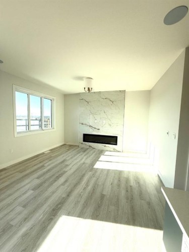 21 Lavelle Close, Red Deer, AB - Indoor Photo Showing Other Room With Fireplace