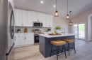 117 Gray Close, Sylvan Lake, AB  - Indoor Photo Showing Kitchen With Stainless Steel Kitchen With Upgraded Kitchen 