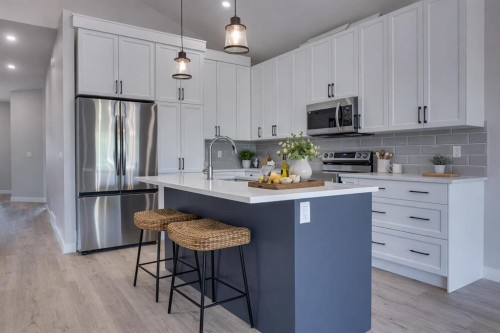 117 Gray Close, Sylvan Lake, AB - Indoor Photo Showing Kitchen With Stainless Steel Kitchen With Upgraded Kitchen