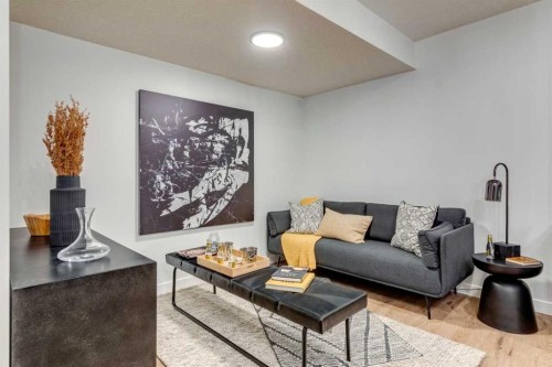 64 Southborough Common, Cochrane, AB - Indoor Photo Showing Living Room