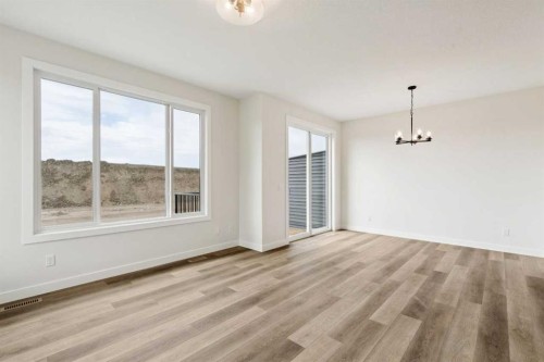 64 Southborough Common, Cochrane, AB - Indoor Photo Showing Other Room