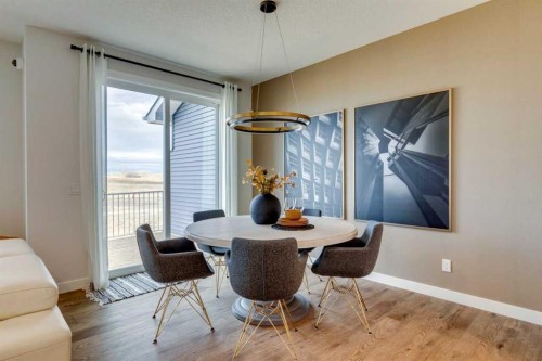 64 Southborough Common, Cochrane, AB - Indoor Photo Showing Dining Room