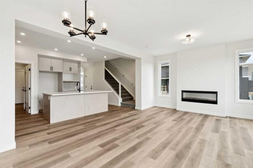 64 Southborough Common, Cochrane, AB - Indoor With Fireplace