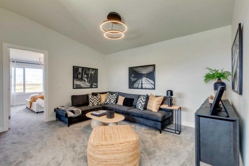 64 Southborough Common, Cochrane, AB - Indoor Photo Showing Living Room