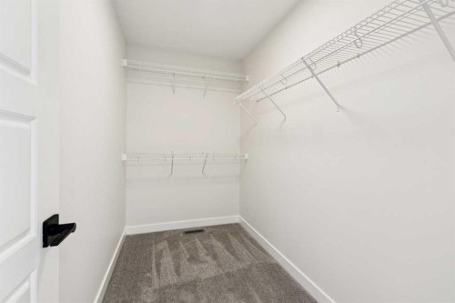 64 Southborough Common, Cochrane, AB - Indoor With Storage