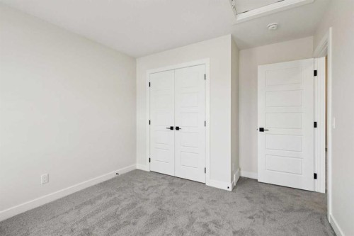 64 Southborough Common, Cochrane, AB - Indoor Photo Showing Other Room