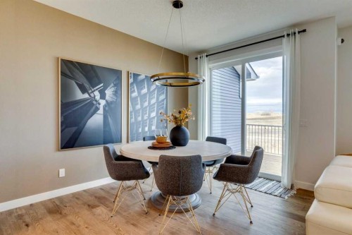 64 Southborough Common, Cochrane, AB - Indoor Photo Showing Dining Room
