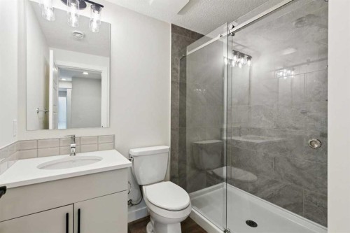 64 Southborough Common, Cochrane, AB - Indoor Photo Showing Bathroom