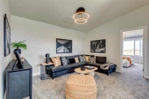 64 Southborough Common, Cochrane, AB - Indoor Photo Showing Living Room