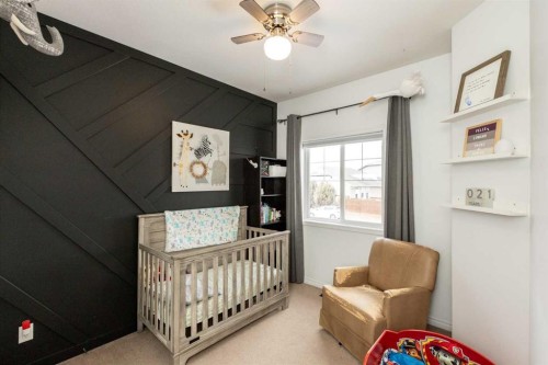 67 Bowman Circle, Sylvan Lake, AB - Indoor Photo Showing Bedroom