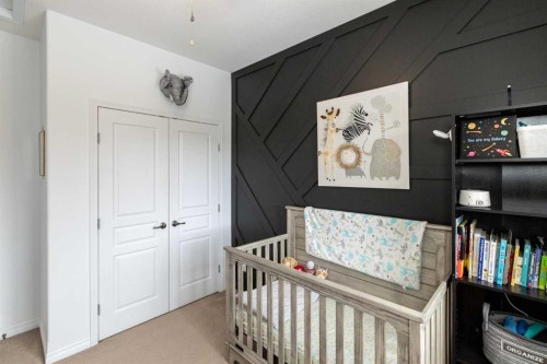 67 Bowman Circle, Sylvan Lake, AB - Indoor Photo Showing Bedroom