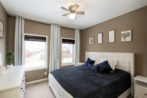 67 Bowman Circle, Sylvan Lake, AB - Indoor Photo Showing Bedroom