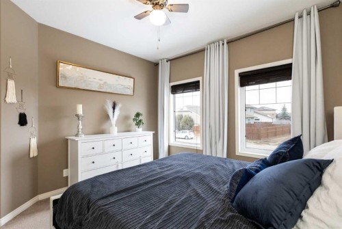 67 Bowman Circle, Sylvan Lake, AB - Indoor Photo Showing Bedroom