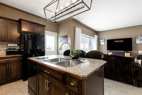 67 Bowman Circle, Sylvan Lake, AB - Indoor Photo Showing Kitchen With Double Sink