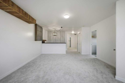32 Hunter Road, Sylvan Lake, AB - Indoor Photo Showing Other Room